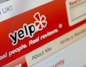 The Yelp website is shown on a computer screen