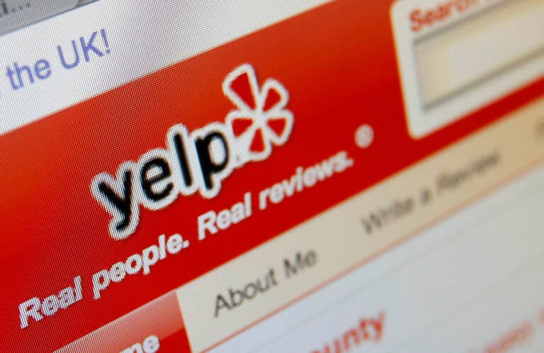 The Yelp website is shown on a computer screen