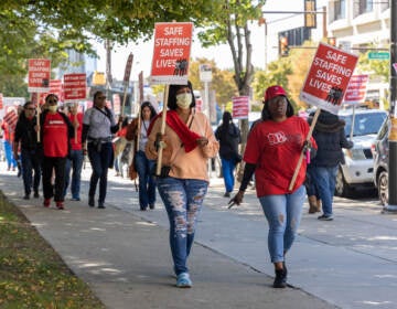 Nurses at Temple University Hospital in Philadelphia picketed on Broad Street during negotiations of a 3-year contract to raise awareness about issues of recruiting, retention and pay disparity, on September 23, 2022. (Kimberly Paynter/WHYY)