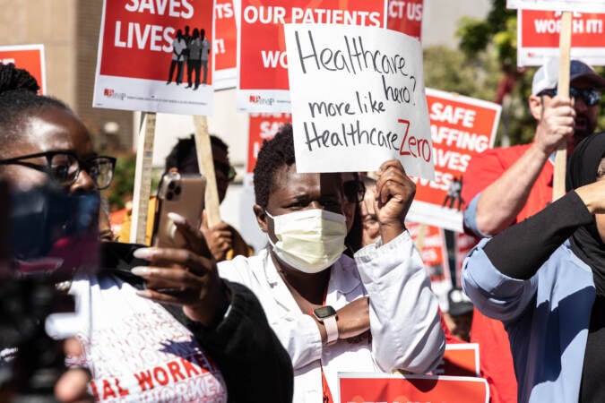 Nurses at Temple University Hospital in Philadelphia picketed on Broad Street during negotiations of a 3-year contract to raise awareness about issues of recruiting, retention and pay disparity, on Sept. 23, 2022. (Kimberly Paynter/WHYY)