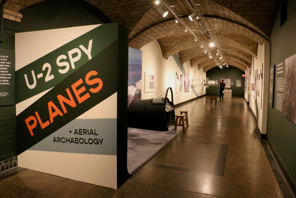 A sign reading "U-2 Spy Planes" is at the entrance of a hallway.