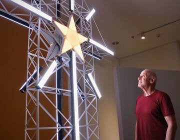 Artist-in-residence Shimon Attie created an 11-foot-tall replica of Bethlehem's 90-toot Star Tower for his exhibit at Lehigh University Art Galleries. (Emma Lee/WHYY)