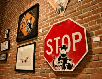 Banksy's rats appeared on street signs in Bristol, England, in the 1990s. (Emma Lee/WHYY)