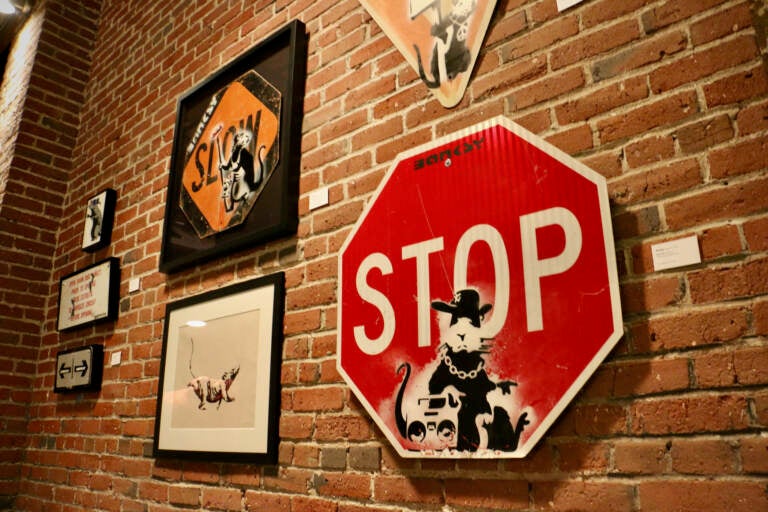 Banksy's rats appeared on street signs in Bristol, England, in the 1990s. (Emma Lee/WHYY)