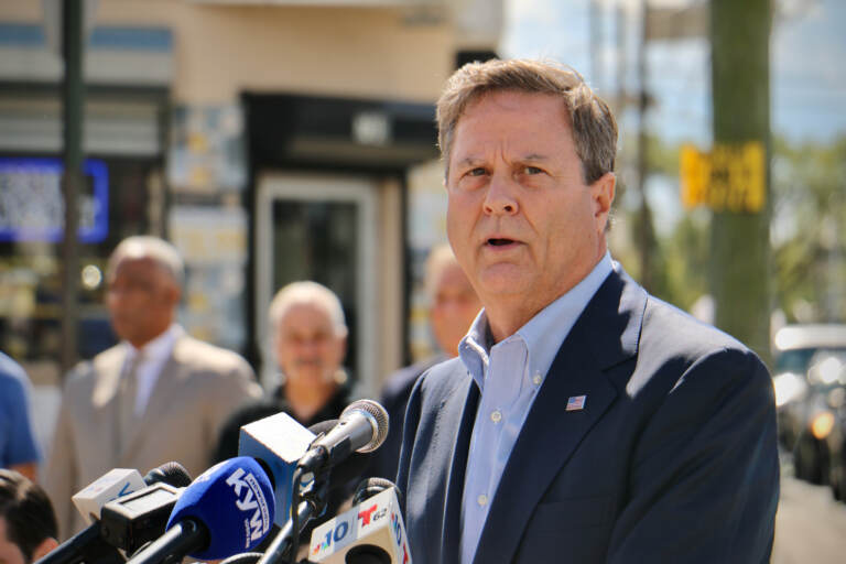 U.S. Rep. Donald Norcross speaks at a press conference at 7th and Chestnut streets in Camden, the site of an illegal dumping ground. (Emma Lee/WHYY)