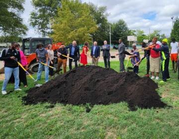 Philadelphia Mayor Jim Kenney and City Council President Darrell Clarke (both center) attend the groundbreaking at the revamped Fotterall Square Park. (Tom MacDonald/WHYY)