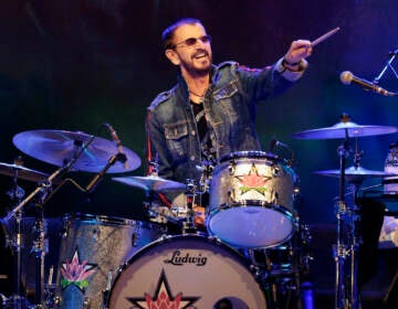 File photo: Ringo Starr plays as part of a concert celebrating the 50th anniversary of Woodstock in Bethel, N.Y., Aug. 16, 2019. (AP Photo/Seth Wenig, File)