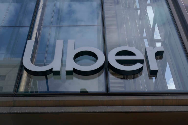 File photo: An Uber sign is displayed at the company's headquarters in San Francisco, Monday, Sept. 12, 2022. (AP Photo/Jeff Chiu, File)