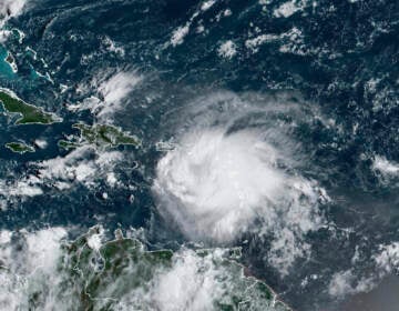 This satellite image provided by NOAA shows Tropical Storm Fiona in the Caribbean on Saturday, Sept. 17, 2022. (NOAA via AP)