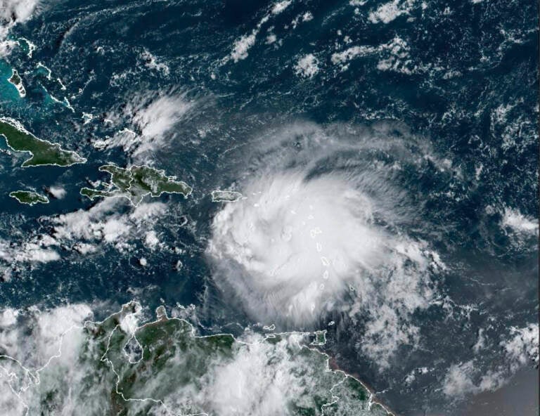 This satellite image provided by NOAA shows Tropical Storm Fiona in the Caribbean on Saturday, Sept. 17, 2022. (NOAA via AP)