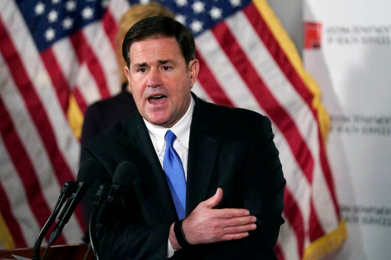 File photo: In this Dec. 2, 2020, file photo, Arizona Republican Gov. Doug Ducey answers a question during a news conference in Phoenix.  (AP Photo/Ross D. Franklin, Pool, File)