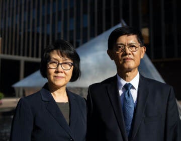 Prof. Xiaoxing Xi and his wife before entering the courthouse on September 14, 2022. (Hannah Beier for the ACLU)