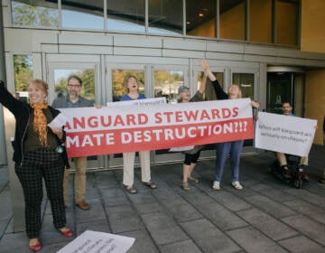 Climate activists with the Earth Quaker Action Team protest Vanguard's fossil fuel investments at their headquarters in Malvern. Eight people who sought to meet with an executive were arrested after refusing to leave and charged with misdemeanor defiant trespass. (Courtesy of Earth Quaker Action Team)