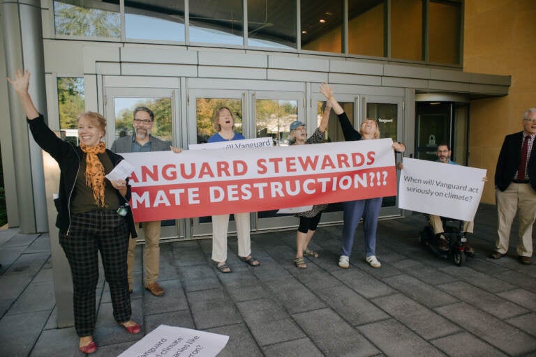 Climate activists with the Earth Quaker Action Team protest Vanguard's fossil fuel investments at their headquarters in Malvern. Eight people who sought to meet with an executive were arrested after refusing to leave and charged with misdemeanor defiant trespass. (Courtesy of Earth Quaker Action Team)