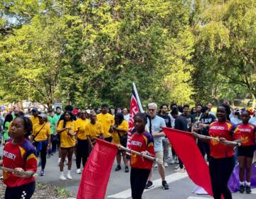 People participate in   the 2022 AIDS Walk in Wilmington, Delaware on Sept. 17, 2022. (Johnny Perez-Gonzalez/WHYY)