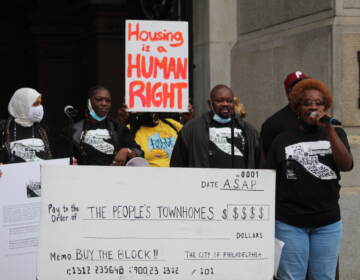 Residents have been protesting the potential sale of UC Townhomes for months since property owners announced last July that the HUD contract wouldn't be renewed. (Cory Sharber/WHYY)