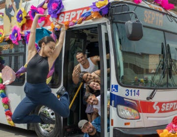 Dancer Ashley Rivera, who is the protagonist in the film, strikes a pose mid-air. Inside the bus, from top to bottom are the production team: Alaitz Ruiz, Christina Castro-Tauser, Alba Martinez, Martin Alfaro and director, Pedro Escárcega. (Courtesy of Ritmo Lab)