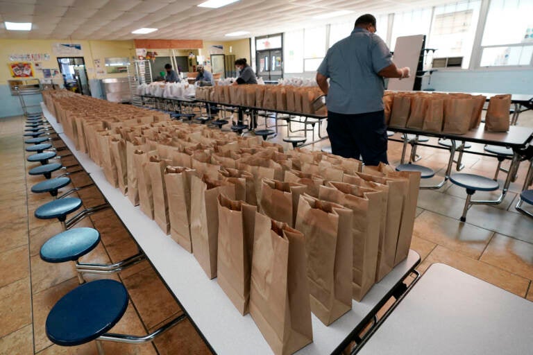 Jefferson County School District Food Service Department staff arrange some of the hundreds of free lunches that was given to students on March 3, 2021 in Fayette, Miss. As one of the most food insecure counties in the United States, many families and their children come to depend on the free meals as their only means of daily sustenance. (Rogelio V. Solis/AP
