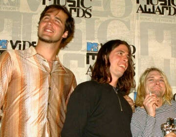 Nirvana band members Krist Novoselic (from left) Dave Grohl and Kurt Cobain pose after receiving the award for best alternative video for 