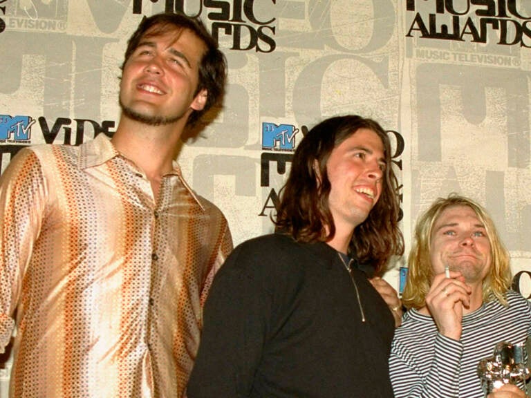 Nirvana band members Krist Novoselic (from left) Dave Grohl and Kurt Cobain pose after receiving the award for best alternative video for 