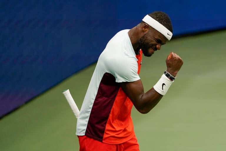 Frances Tiafoe reacts after winning a tie breaker against Andrey Rublev, of Russia, during the quarterfinals of the U.S. Open tennis championships on Wednesday in New York. (Seth Wenig/AP)