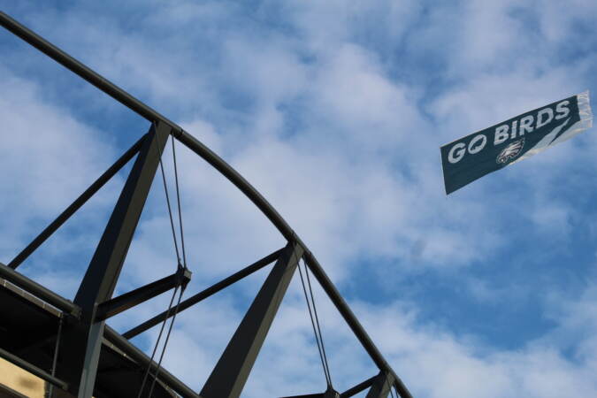 Planes with banners attached to them flew above Lincoln Financial Field ahead of Monday night's game. (Cory Sharber/WHYY)