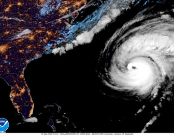 A map shows the path of Hurricane Fiona.