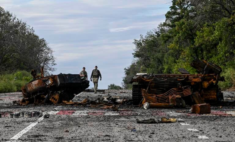 Destroyed armored vehicles litter the road in Balakliya, Kharkiv region, on Saturday. (Juan Barreto/AFP via Getty Images)