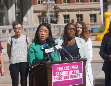 Councilmembers Helen Gym, Kendra Brooks, and Jamie Gauthier speak at a press conference outside City Hall