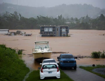 A home is submerged in floodwaters caused by Hurricane Fiona in Cayey, Puerto Rico