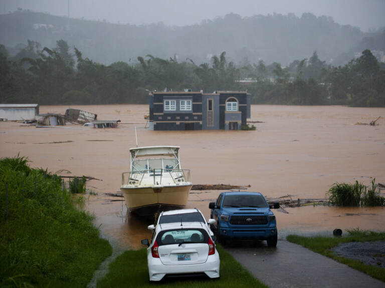 A home is submerged in floodwaters caused by Hurricane Fiona in Cayey, Puerto Rico