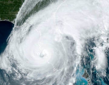 A satellite image shows Hurricane Ian making landfall in southwest Florida