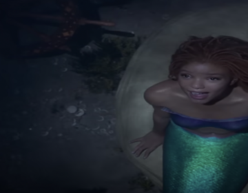 A screenshot of Halle Bailey as Ariel in the new live-action Disney film