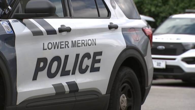 A police car reads Lower Merion Police.