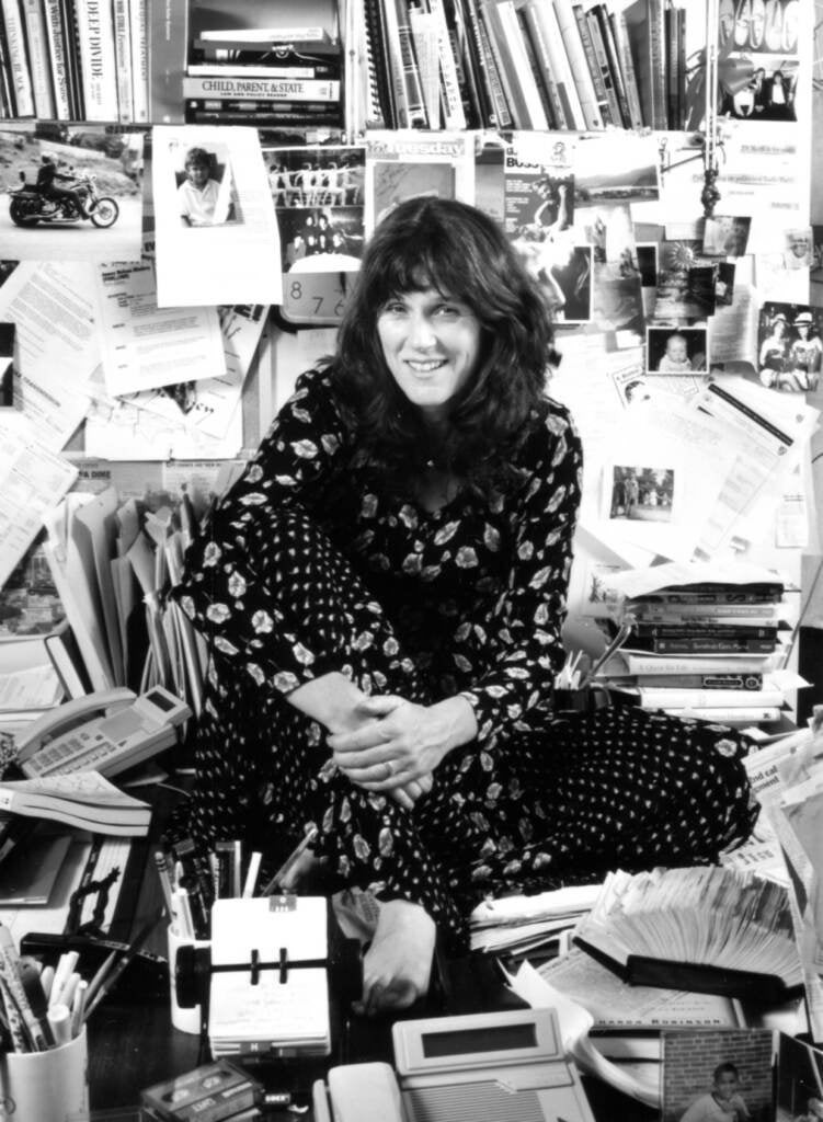 Marty Moss-Coane is seen in her office in a black and white photo