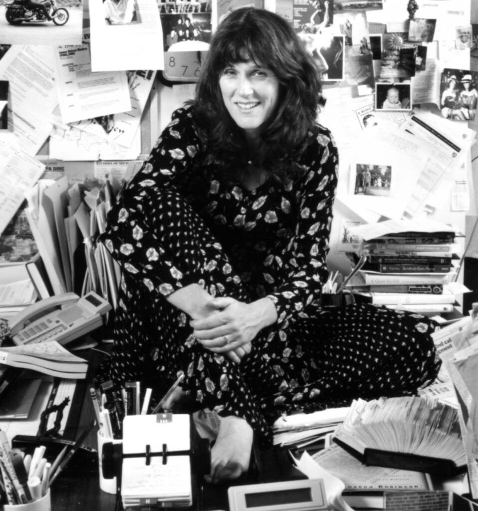 Marty Moss-Coane is seen in her office in a black and white photo