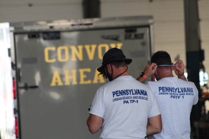 Pennsylvania Task Force 1 gets their equipment ready ahead of deploying to South Carolina to aid potential victims of Hurricane Ian on Sep. 28, 2022. (Cory Sharber/WHYY)