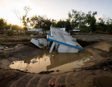 View of a house that was washed away by Hurricane Fiona at Villa Esperanza in Salinas, Puerto Rico, Wednesday, September 21, 2022. (AP Photo/Alejandro Granadillo)