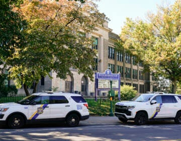 Police vehicles are parked at Roxborough High School