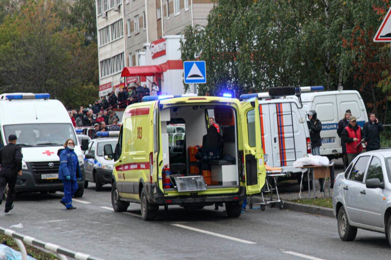 Police and paramedics work at the scene of a shooting at school No. 88 in Izhevsk