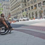 Jaleel King is seen in a wheelchair at Broad and Chestnut