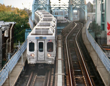 A train on tracks as seen from above.