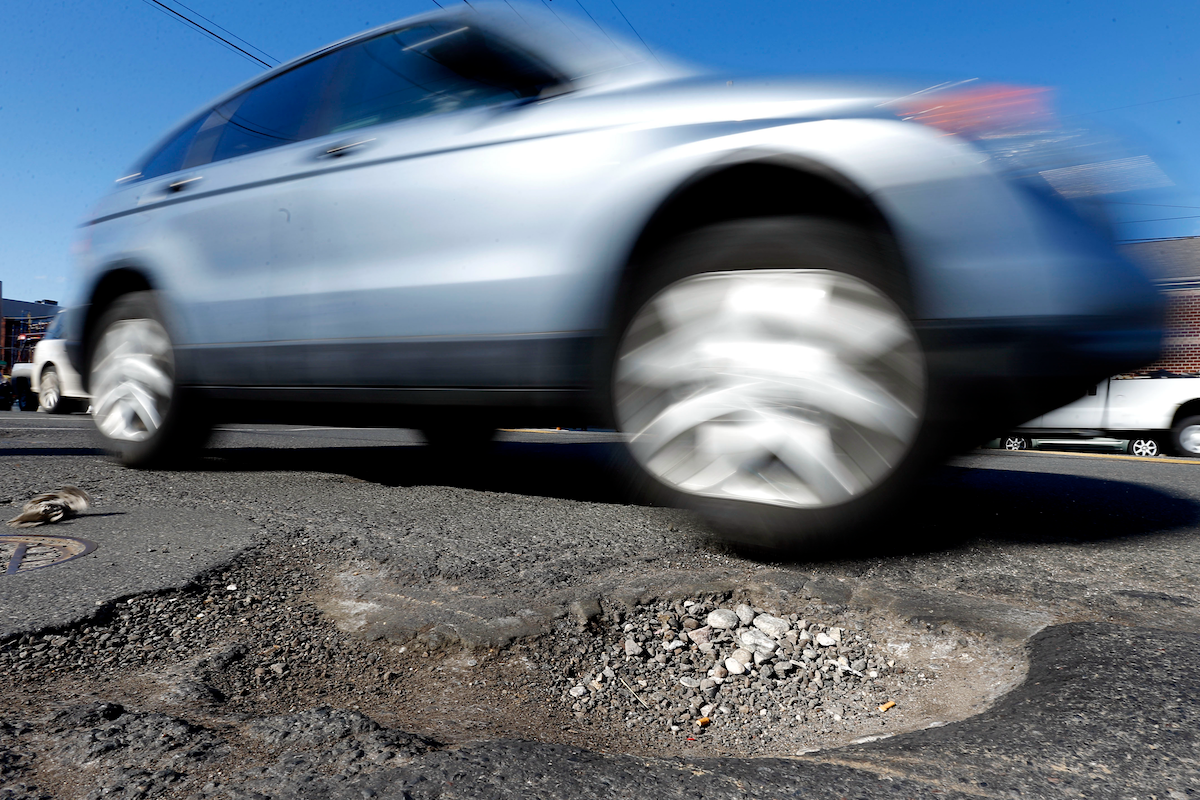 Getting to the bottom Philadelphia's potholes