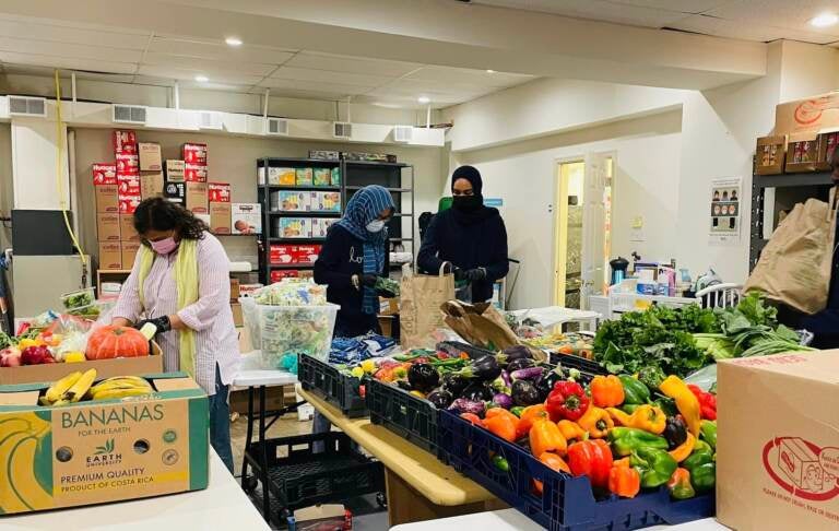 ICNA Relief volunteers organize fresh produce from the Green Resource Center. ICNA Relief serves about 100 families a week in Norristown. (Courtesy of ICNA Relief)