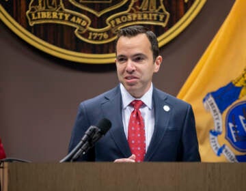 attorney general matt platkin speaks at a podium