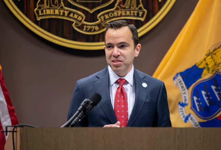 attorney general matt platkin speaks at a podium