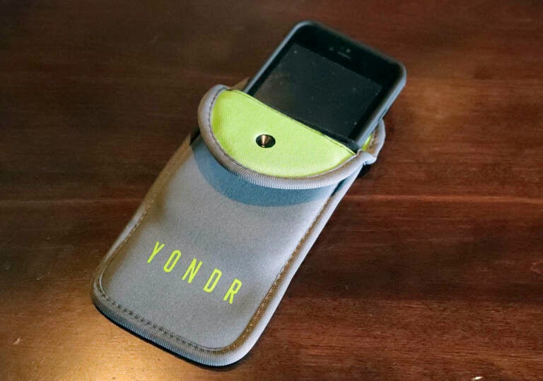A lockable pouch that people can put their cell phone in