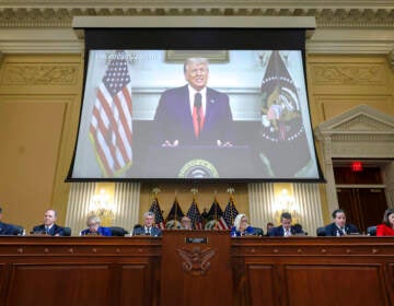 A video of then-President Donald Trump speaking is displayed as the House select committee investigating the Jan. 6 attack on the U.S. Capitol holds a hearing on Capitol Hill in Washington, Thursday, Oct. 13, 2022. (Alex Wong/Pool Photo via AP)