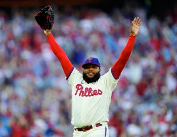 Philadelphia Phillies relief pitcher Jose Alvarado (46) acknowledges the fans after being relieved during the seventh inning in Game 4 of baseball's National League Division Series between the Philadelphia Phillies and the Atlanta Braves, Saturday, Oct. 15, 2022, in Philadelphia. (AP Photo/Matt Rourke)