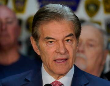 Dr. Mehmet Oz, then the Republican candidate for U.S. Senate in Pennsylvania, visits the Fraternal Order of Police Lodge 91 in West Homestead, Pa., Tuesday, Oct. 18, 2022. (AP Photo/Gene J. Puskar)